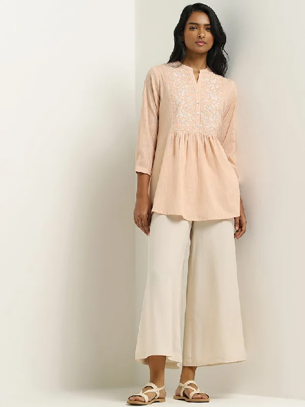 Utsa Peach Embroidered Cotton Kurti