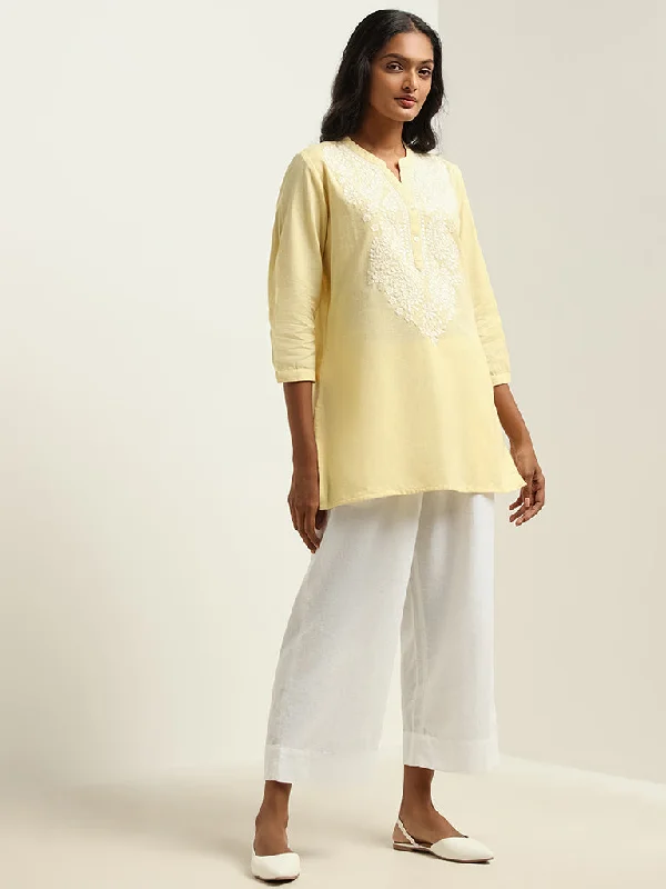 Utsa Yellow Embroidered Kurti